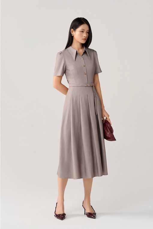 Đầm xoè đai eo đính cúc trang trí