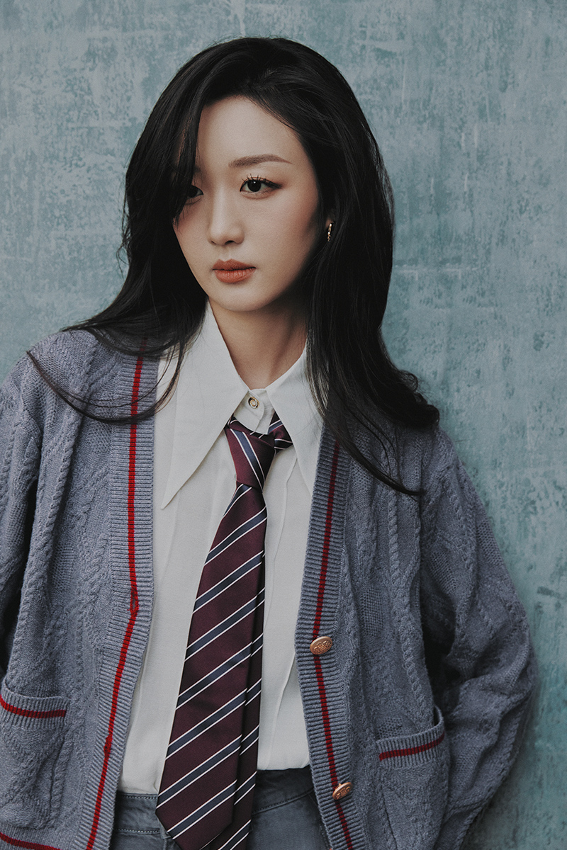 Áo khoác len túi ốp bo phối kẻ Áo khoác len túi ốp bo phối kẻ