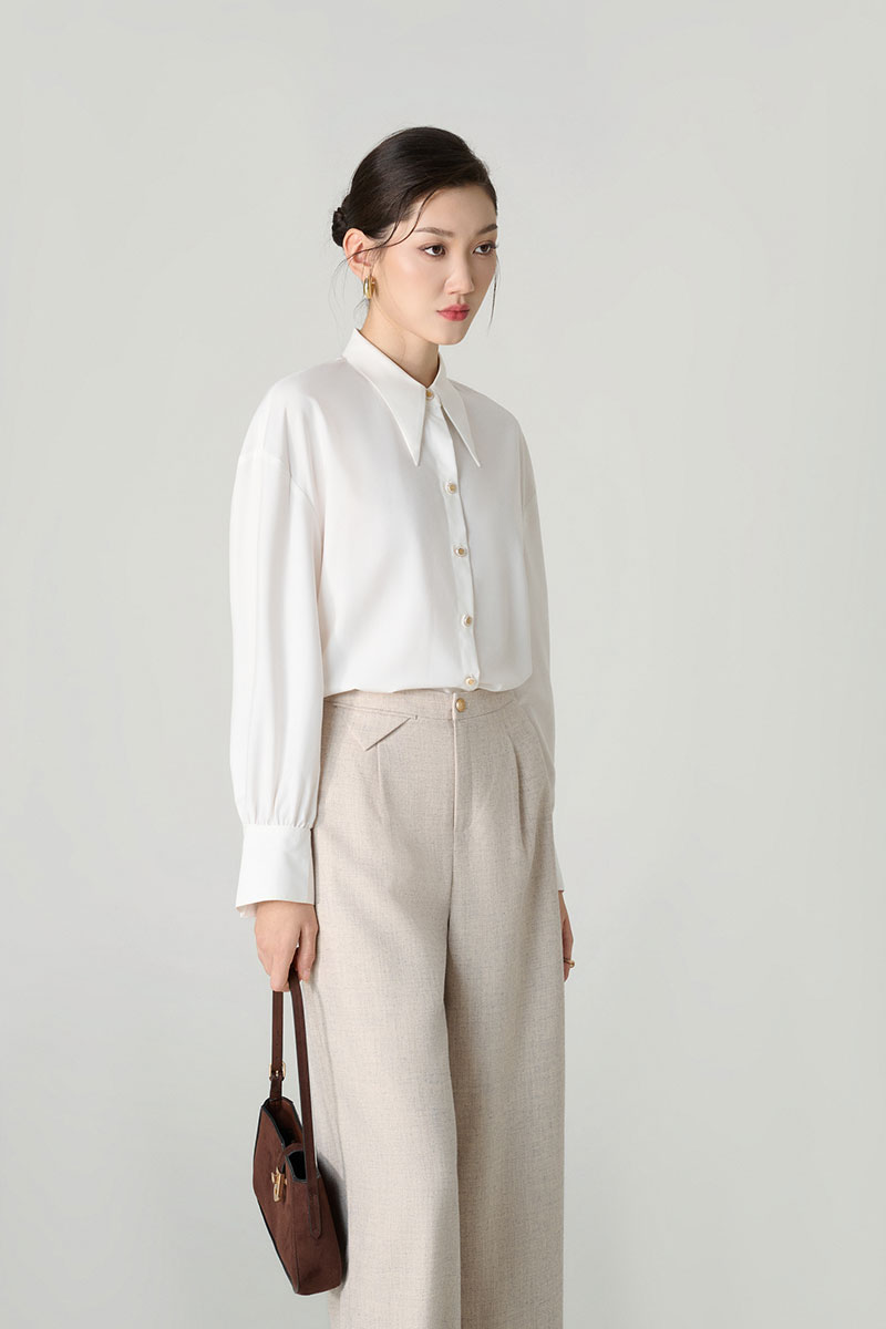 Sơ mi DT vai rơi măng sét loe điệu Sơ mi DT vai rơi măng sét loe điệu