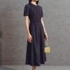 Đầm xoè denim thân bấu mí đai eo TT