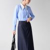 Chân váy dài diễu chỉ súp gấu TT Sơ mi DT croptop can vai phối cổ