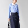 Sơ mi DT croptop can vai phối cổ Chân váy dài diễu chỉ súp gấu TT