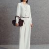 Sơ mi DT họng cổ nhúm buộc dây Sơ mi DT họng cổ nhúm buộc dây