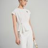 Áo kiểu peplum rủ bèo lệch Áo kiểu peplum rủ bèo lệch