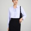 Sơ mi DT họng cổ nhúm buộc dây Chân váy suông tà bong cạp