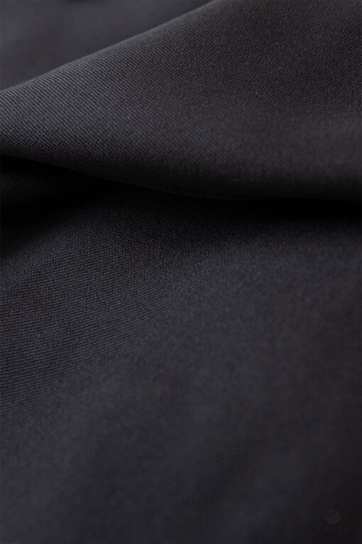 Chân váy A vạt mở đính cúc