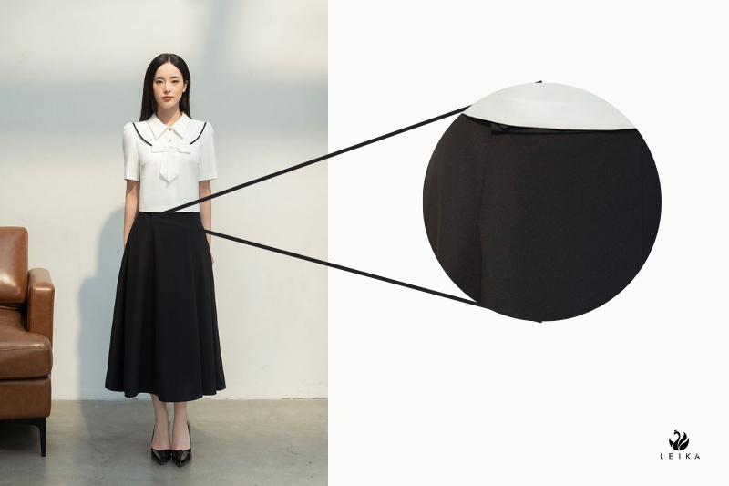 Chân váy xoè xếp ly to đính cúc