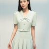 Đầm xoè chiết ly đính nơ eo