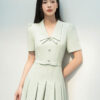Đầm xoè chiết ly đính nơ eo