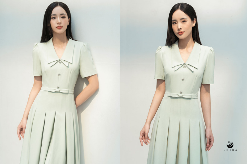Đầm xoè chiết ly đính nơ eo
