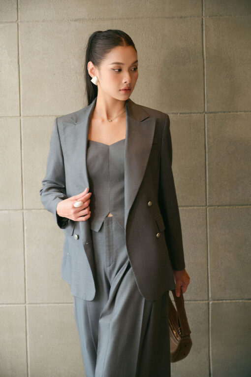 Áo vest suông ôm vạt cong