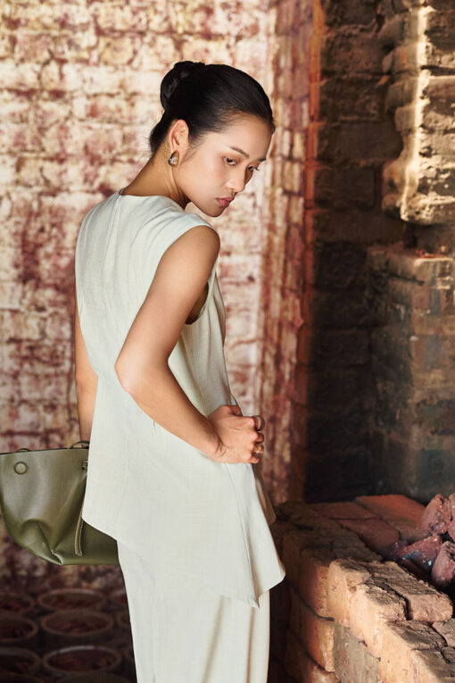 Áo kiểu SN tà lệch eo chiết ly đính cúc