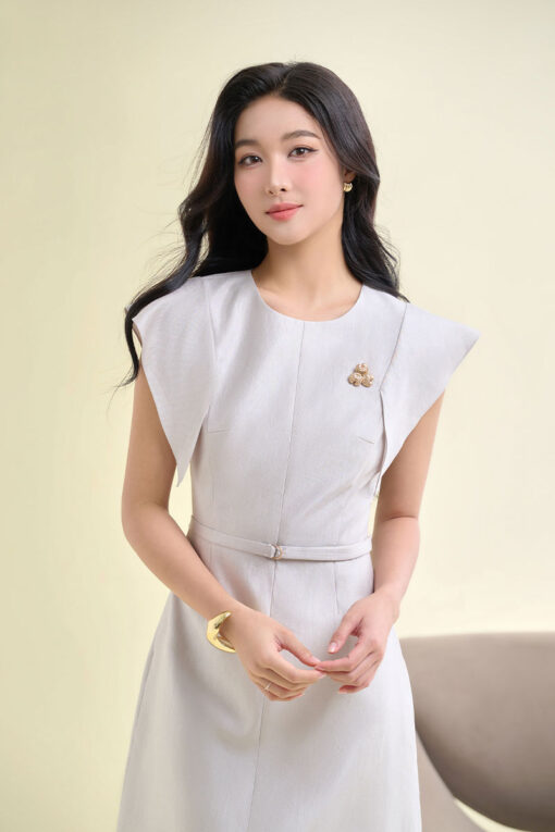 Đầm A tay bong ngực đính cúc trang trí