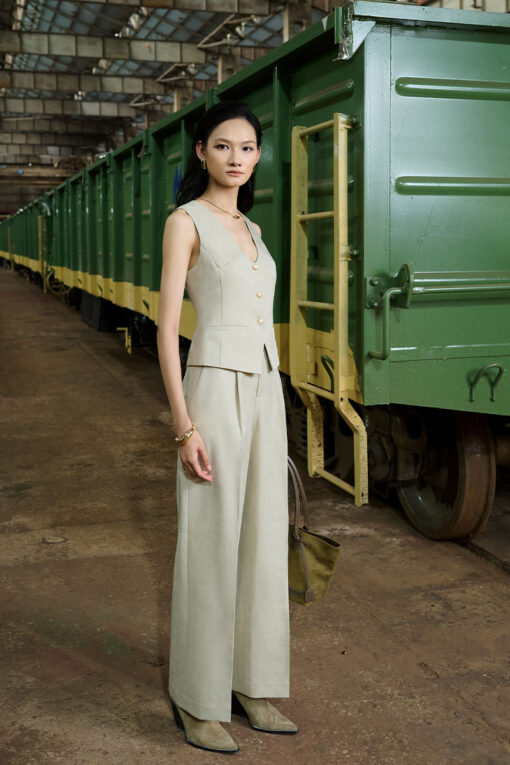 Áo gile cổ trứng bổ cơi túi trang trí