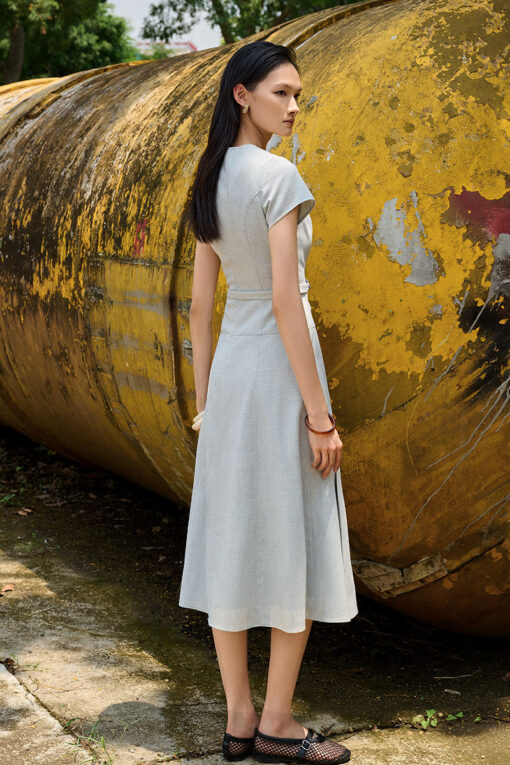 Đầm xoè cổ tròn can hông xếp ly gấu