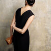 Jumpsuit sát nách cổ V túi chéo