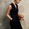 Jumpsuit sát nách cổ V túi chéo