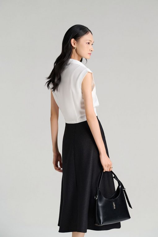 Chân váy xoè bong miệng túi đính cúc