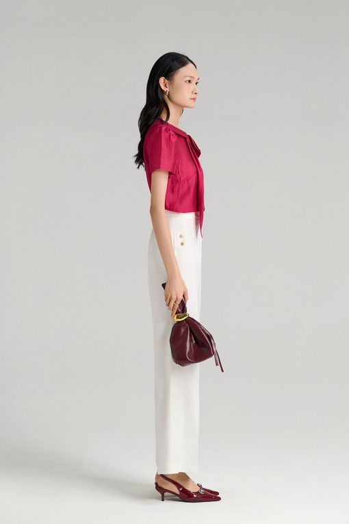 Quần loe ốp bong hông đính cúc