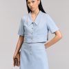 Chân váy A nẹp đắp đính cúc