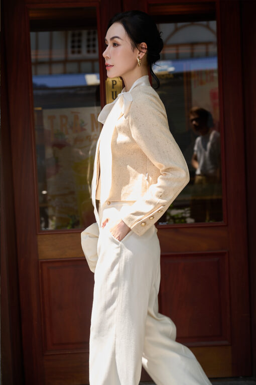 Áo kiểu croptop vạt lệch tay đính cúc