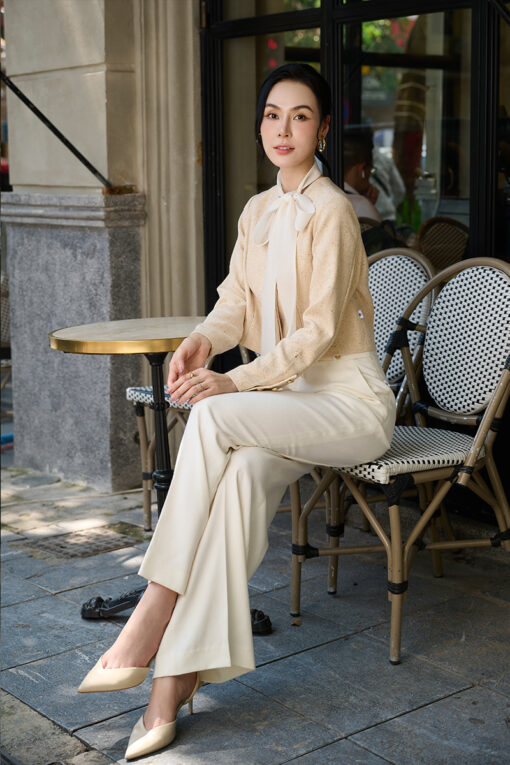 Áo kiểu croptop vạt lệch tay đính cúc