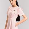 Đầm xoè bong ngực đính cúc trang trí Đầm xoè bong ngực đính cúc trang trí