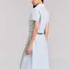 Sơ mi CT croptop xẻ gấu phối cổ Sơ mi CT croptop xẻ gấu phối cổ