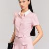 Sơ mi CT croptop xẻ gấu phối cổ Sơ mi CT croptop xẻ gấu phối cổ