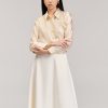 Sơ mi DT hoa laze đính ngực Sơ mi DT hoa laze đính ngực