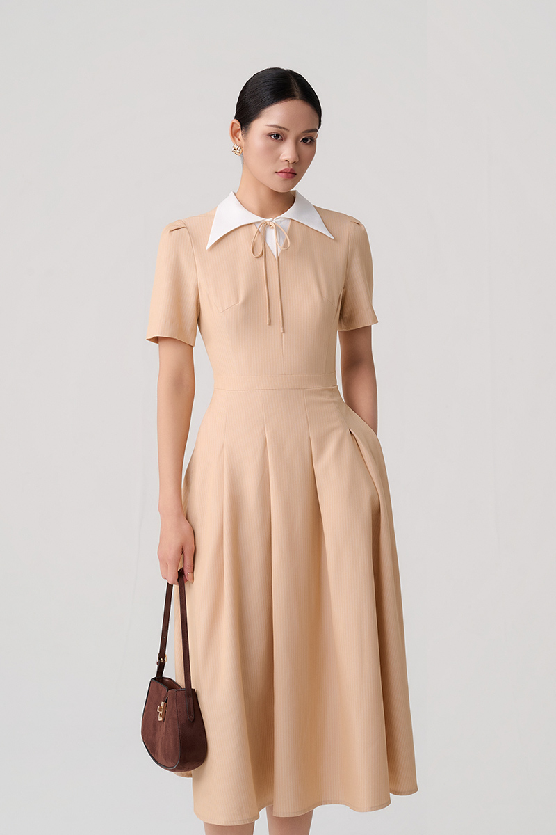 Đầm xoè cổ phối đính nơ Đầm xoè cổ phối đính nơ