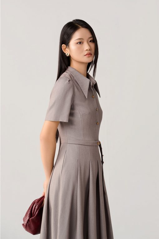 Đầm xoè đai eo đính cúc trang trí