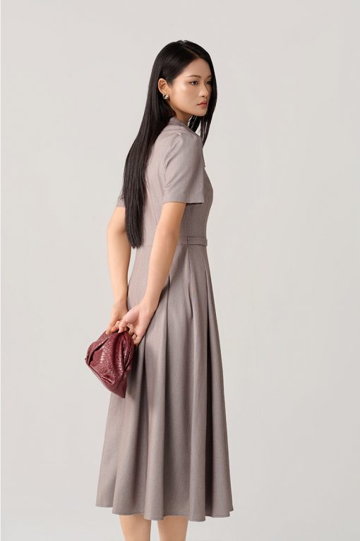 Đầm xoè đai eo đính cúc trang trí