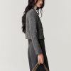 Áo kiểu tweed DT can thân tua rua