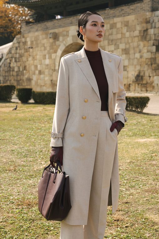 Áo măng tô cổ cách điệu đính cúc