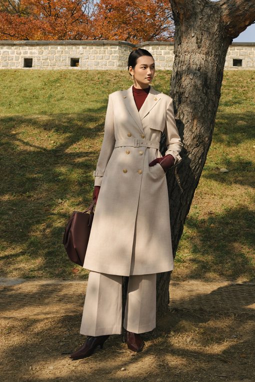 Áo măng tô cổ cách điệu đính cúc