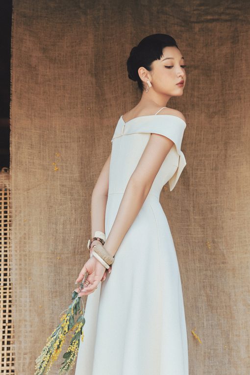 Đầm party nơ liền tay luồn khoen