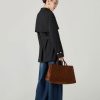 Áo khoác lửng tay raglan kẹp D kèm đai Áo khoác lửng tay raglan kẹp D kèm đai