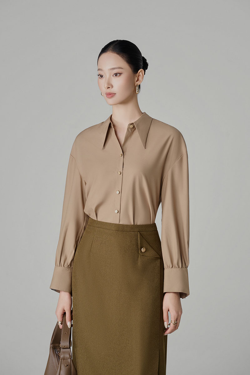 Chân váy A can lật chéo đính cúc