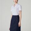 Chân váy suông bong lệch đính cúc