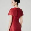 Đầm xoè tay cape đính cúc