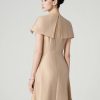Đầm xoè tay cape đính cúc