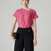 Sơ mi CT tay liền, cổ xếp ly lệch đính cúc
