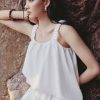 Áo kiểu 2 dây giật gấu vạt lệch