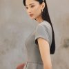 Áo kiểu CT peplum xẻ trước