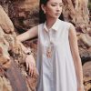 Đầm suông xếp ly thân vạt gấu chéo