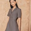 Đầm xoè cổ 2 ve đai eo vát