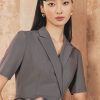 Đầm xoè cổ 2 ve đai eo vát
