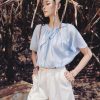 Sơ mi CT chun gấu cổ đính nơ