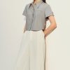 Sơ mi CT croptop nẹp bong đính cúc